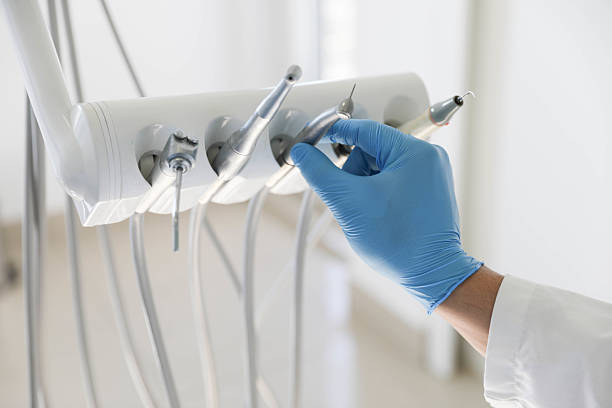 Professional Tooth Extraction technician working in Lawrenceville, NJ
